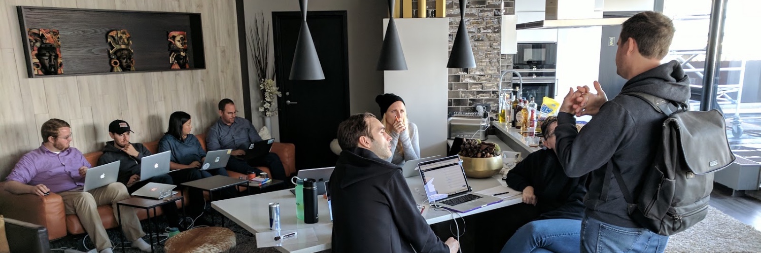 A photo of the Customer io team working together