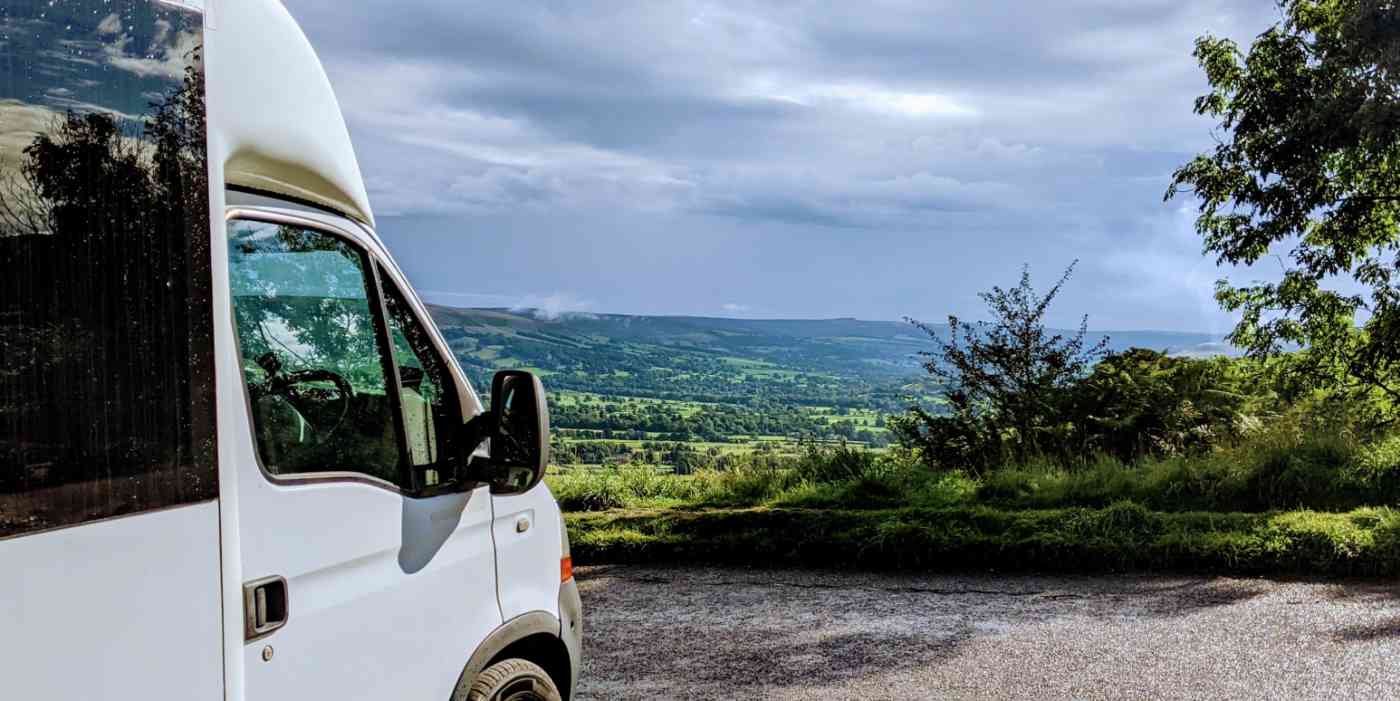 Hero image of a van looking out over a beautiful view