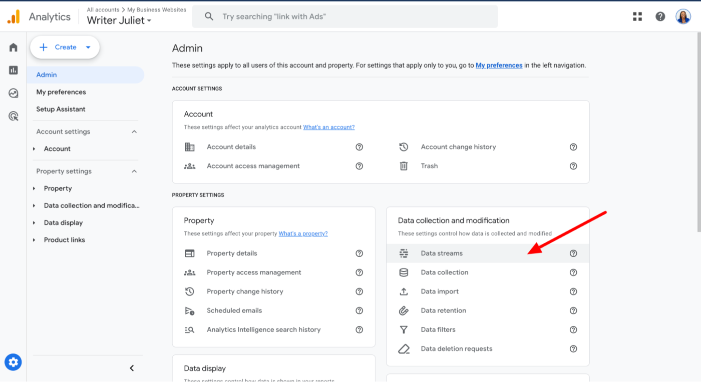 Google Analytics Admin dashboard with an arrow pointing to data streams.