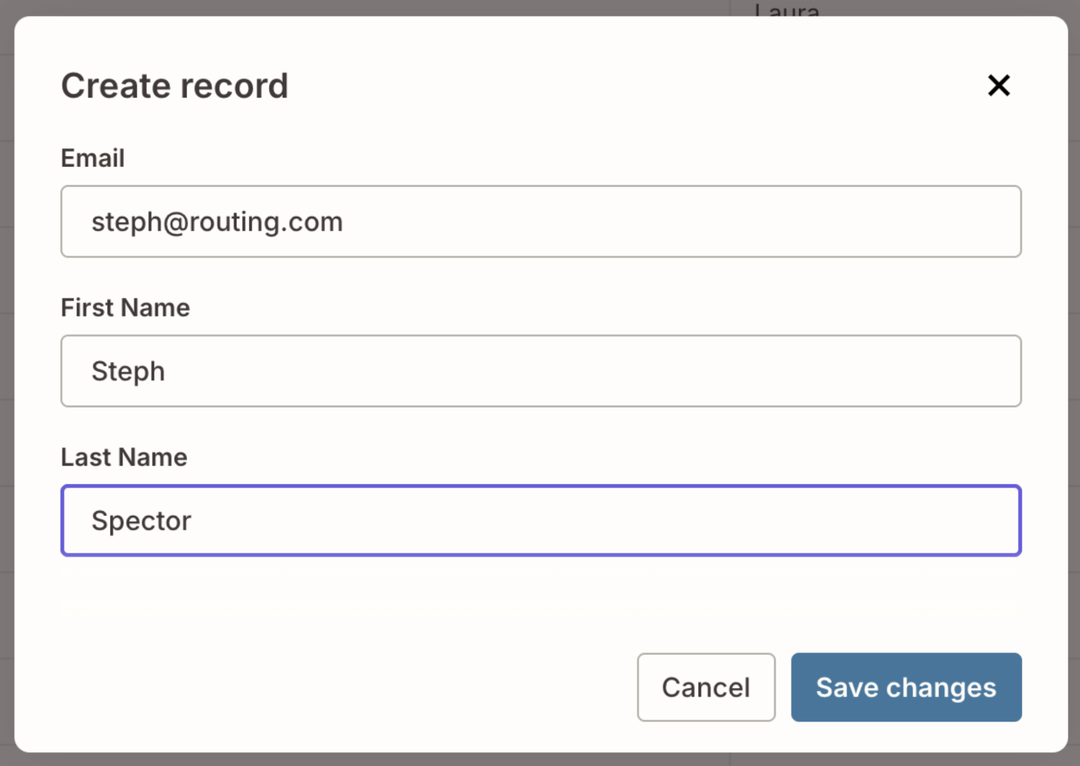 A pop-up window titled "Create record" showing fields for Email, First Name, and Last Name filled in with "steph@routing.com," "Steph," and "Spector," along with Cancel and Save changes buttons