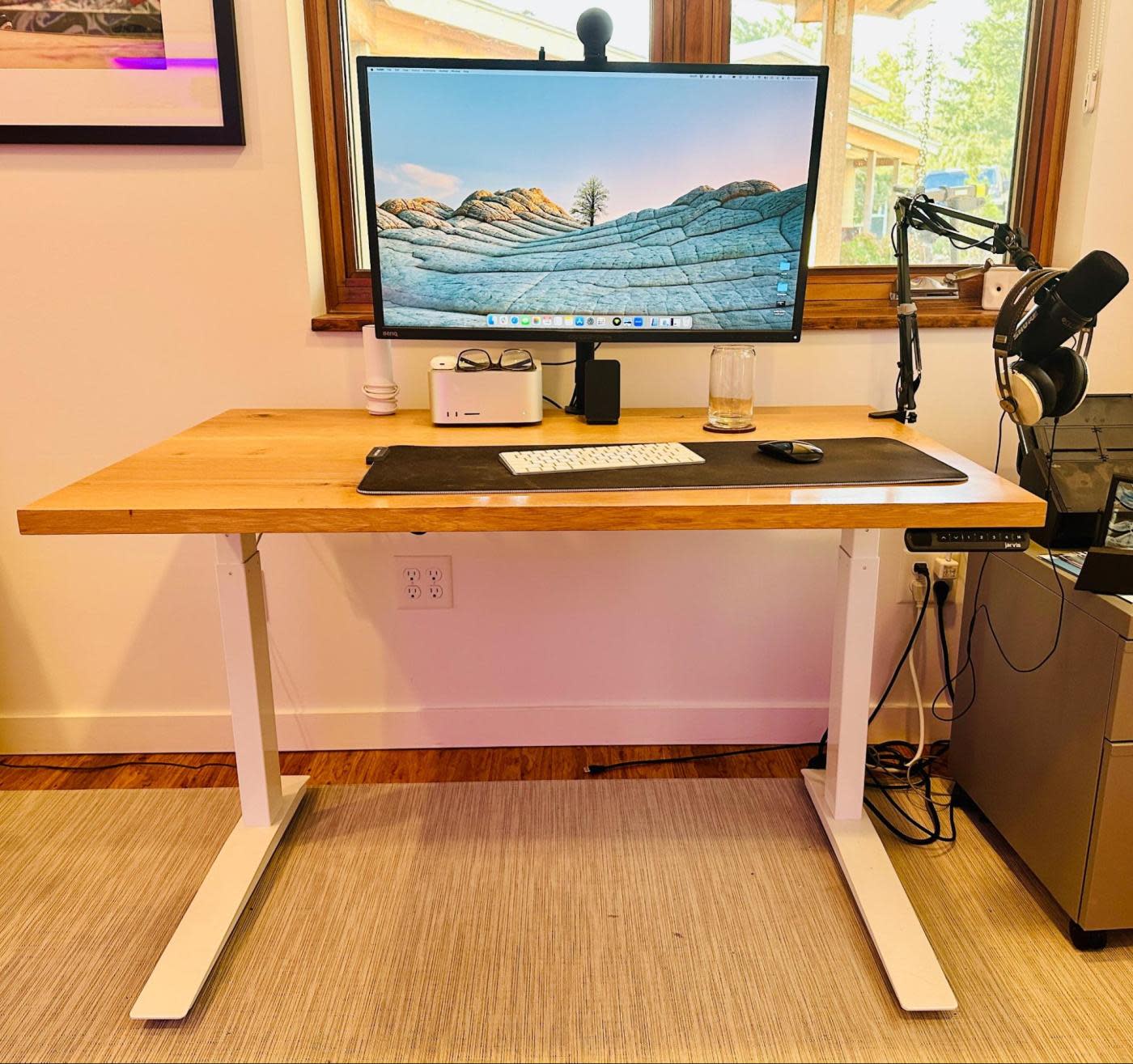 A photo of a minimalist desk setup