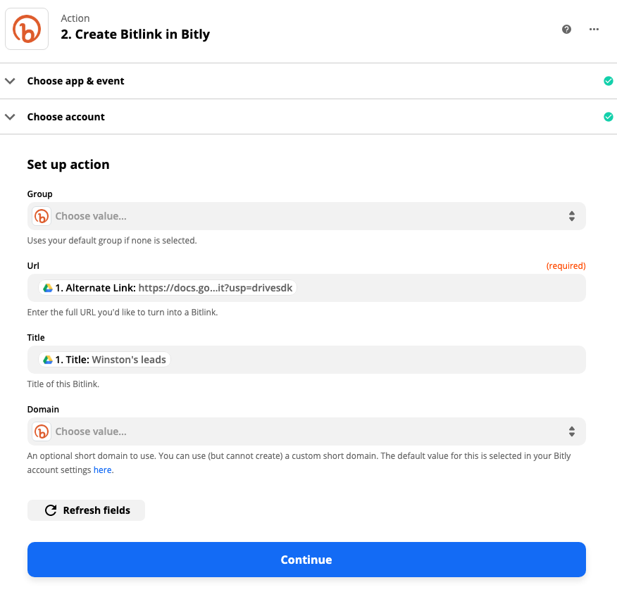 Setting up the Bitly action step in the Zap editor. Input fields for Google Drive file titles and links are preselected in the Bitly link and title.