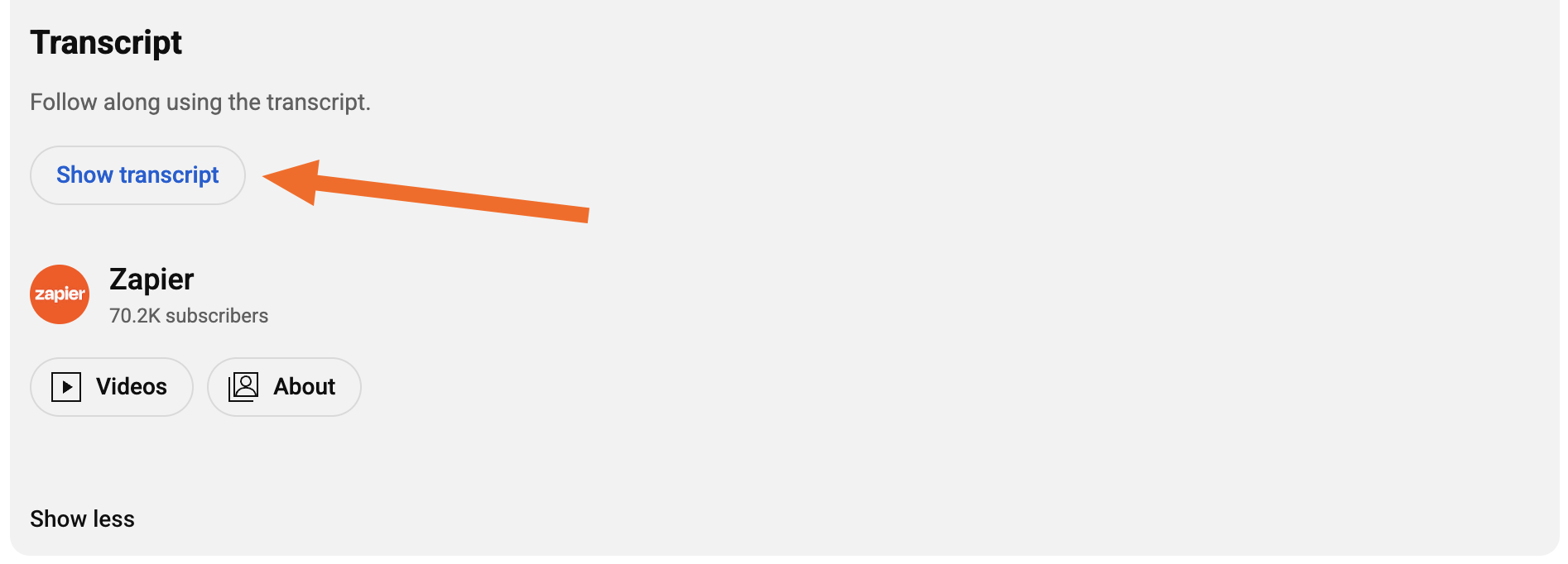 Screenshot of the "show transcript" button with an orange arrow pointing to it