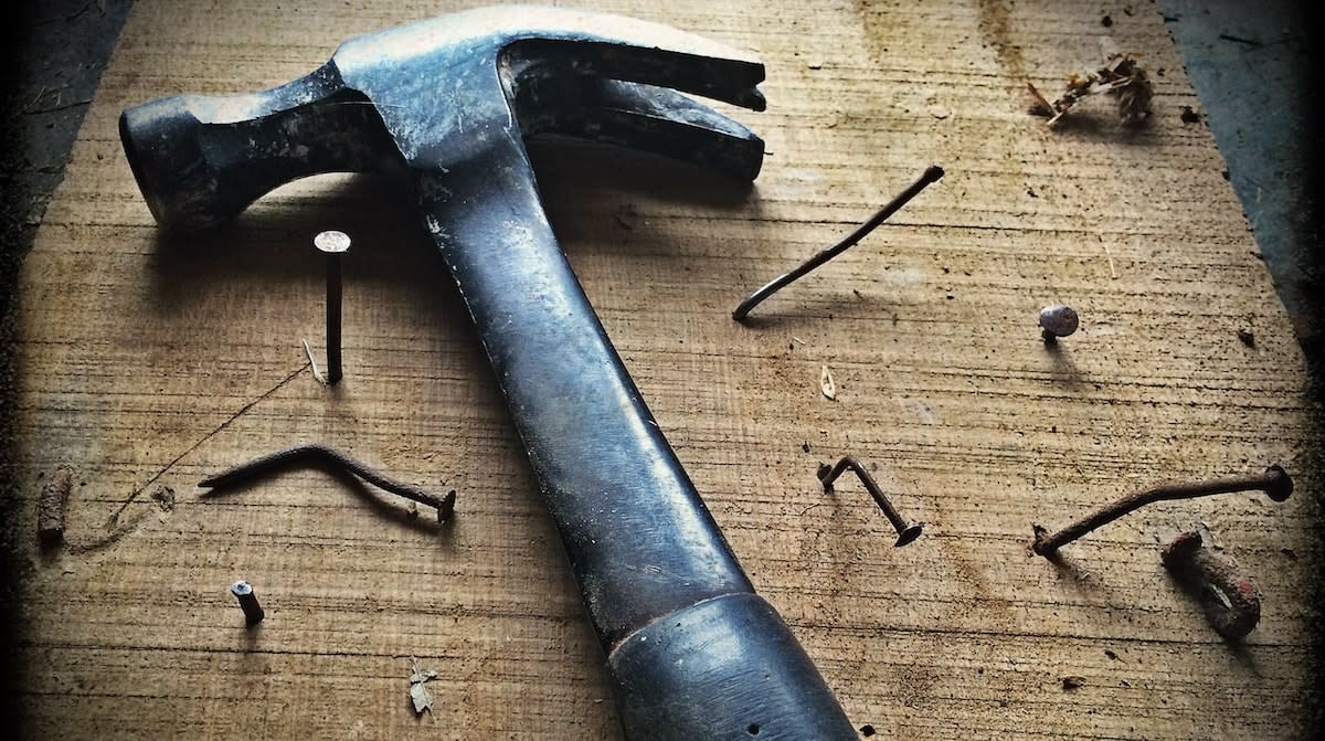 bent nails in wood