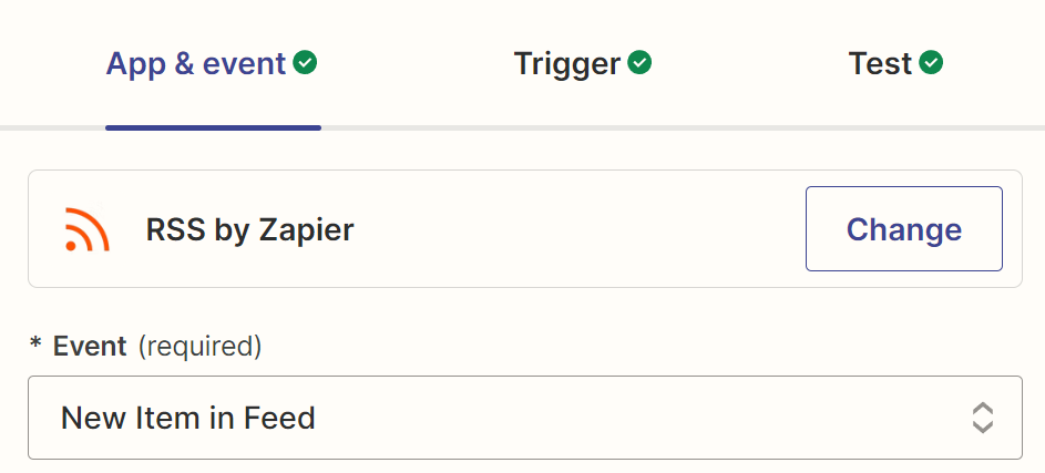 A trigger step in the Zap editor with RSS by Zapier selected for the trigger app and New Item in Feed selected for the trigger event.