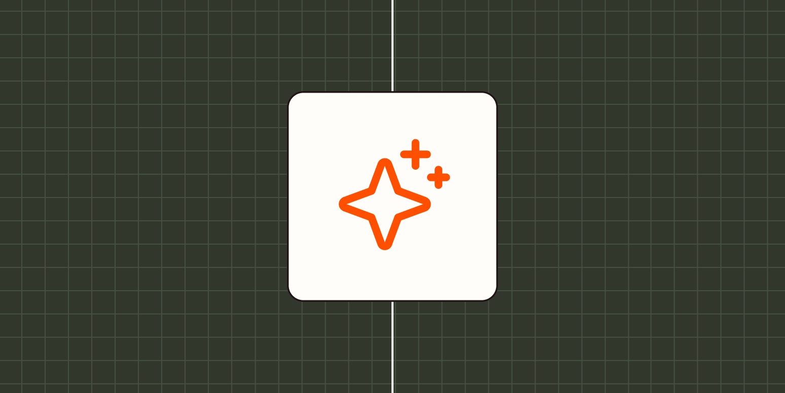 An orange sparkle against a dark green background