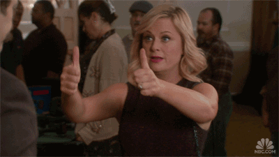 Leslie Knope from Parks and Rec giving two thumbs up