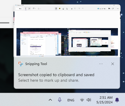 Popup notification from Snipping Tool with a preview of a screenshot. 
