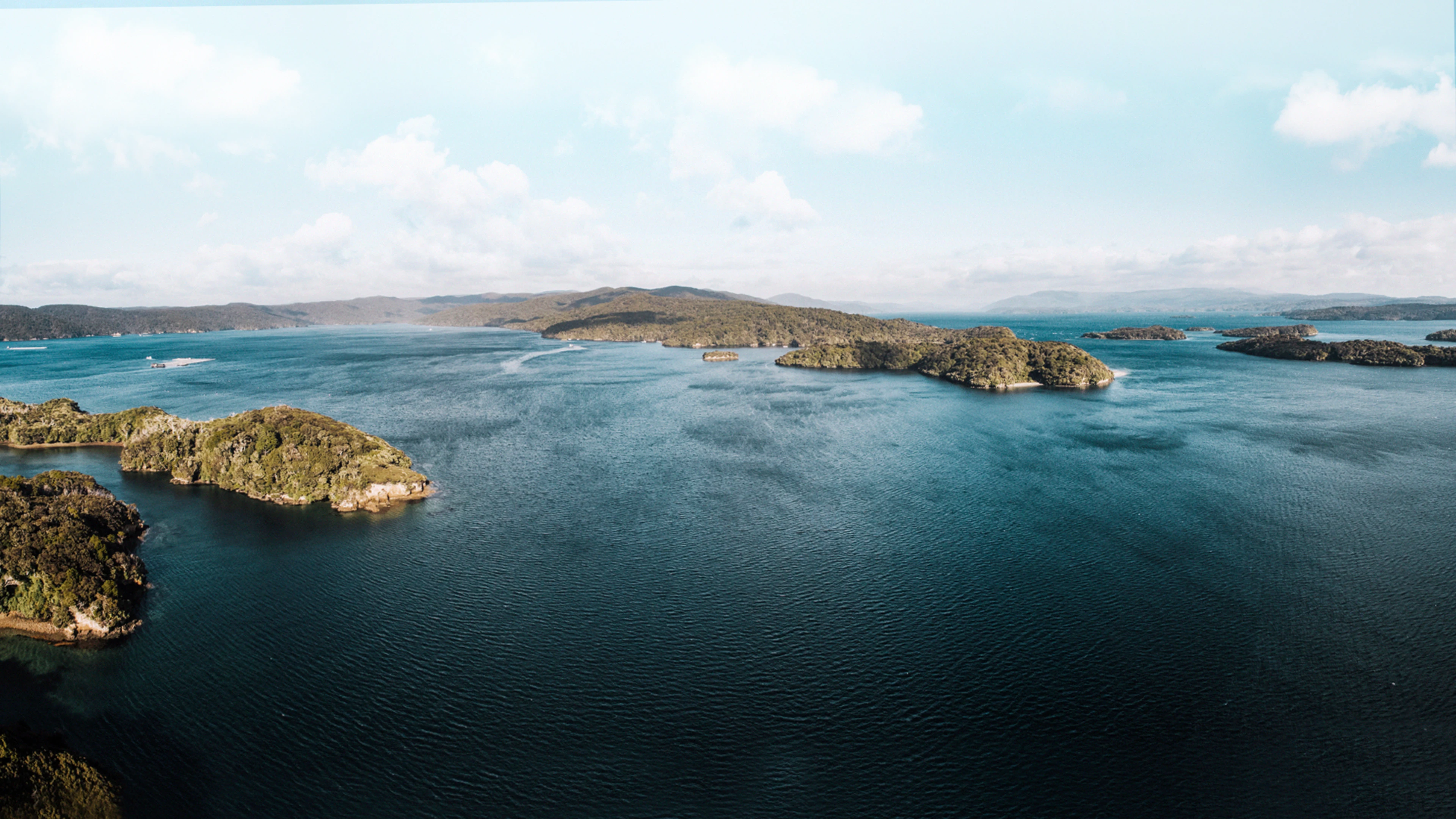 Aerial view of Big Glory Bay in Stewart Island, New Zealand