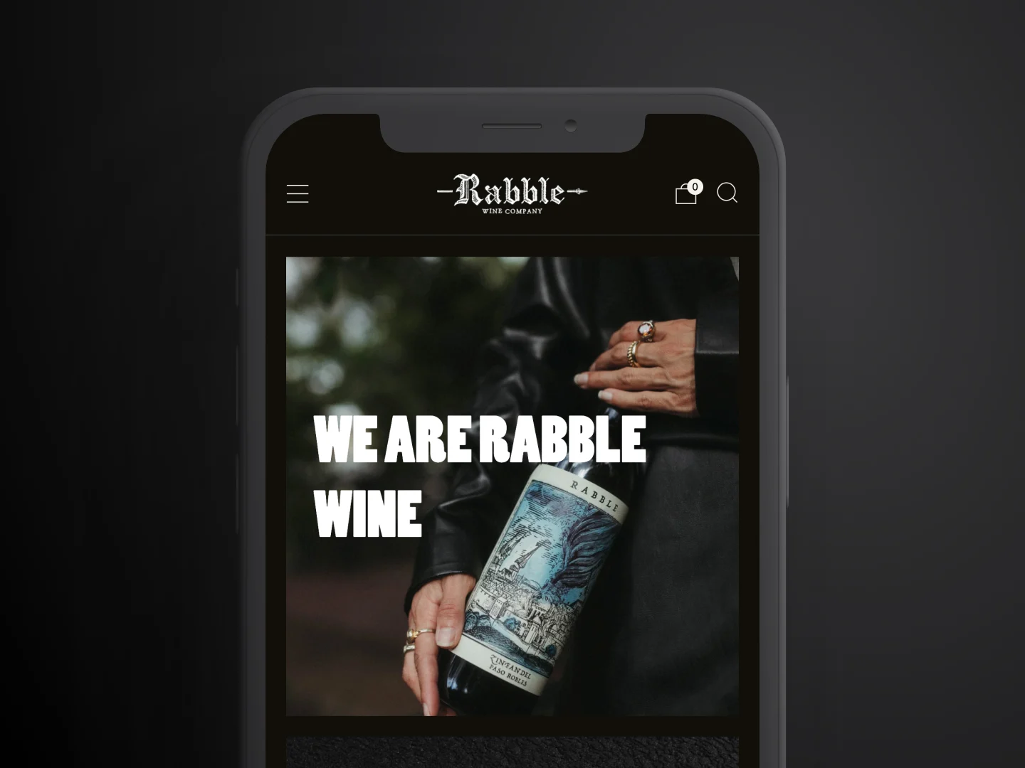 A preview of the Rabble Wine homepage on a mobile device mockup