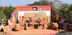 Discover Udaipur's artistic treasures with TravelTaxi - The vibrant Shilpgram Crafts Village.