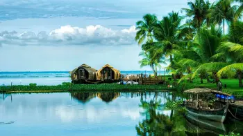 Experience the serene Kerala backwaters with TravelTaxi's guided houseboat tours in Alleppey.