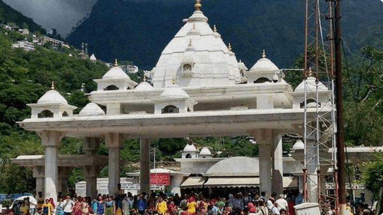 Discover Vaishno Devi's artistic treasures with TravelTaxi - The intricate temple carvings.