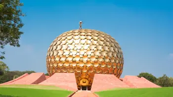 Discover the architectural wonder of Matrimandir with TravelTaxi's guided tours in Auroville, Pondicherry.