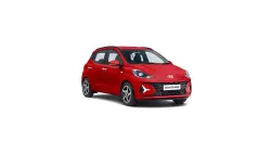 Experience compact luxury with TravelTaxi - The stylish Hyundai i10 Grand MT Petrol.