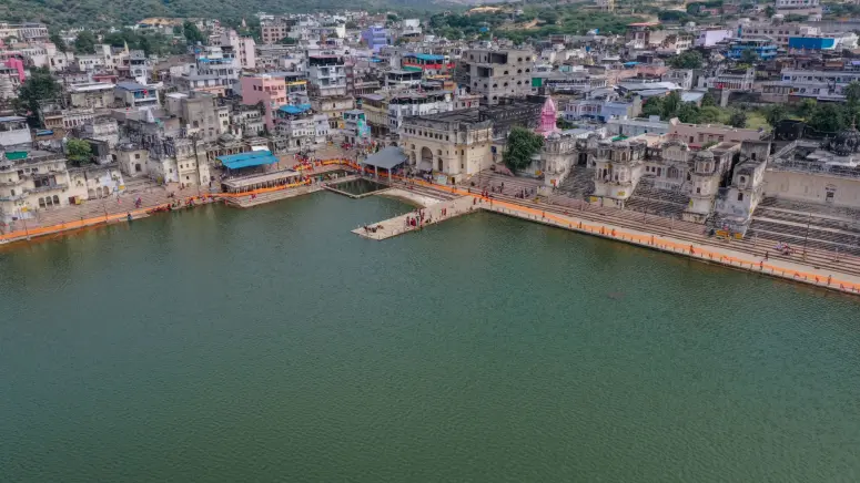  Explore the sacred Pushkar Lake with TravelTaxi - Take a dip in the holy waters and seek blessings at the ghats.