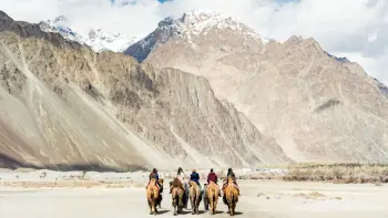 Discover ancient Buddhist heritage at Leh Palace with TravelTaxi's guided cultural tours in Ladakh.