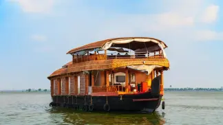 Discover vibrant local culture at Alleppey Beach with TravelTaxi's guided coastal tours in Kerala.