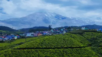 Unwind in Munnar's serene landscapes with TravelTaxi - The tranquil Mattupetty Dam and Lake.