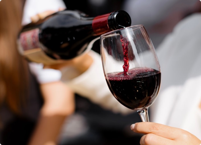 Pouring a glass of French Cabernet Sauvignon red wine