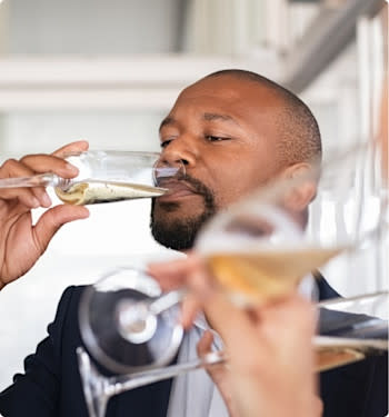 Man drinking sparkling wine
