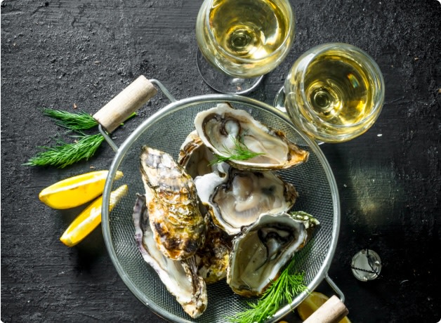 White Burgundy Chardonnay wine paired with oysters