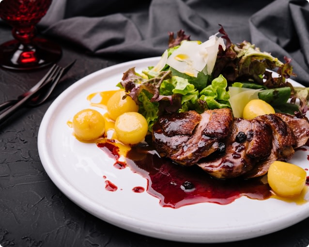 Grilled duck breast with cherry sauce pairs well with Pinot Noir