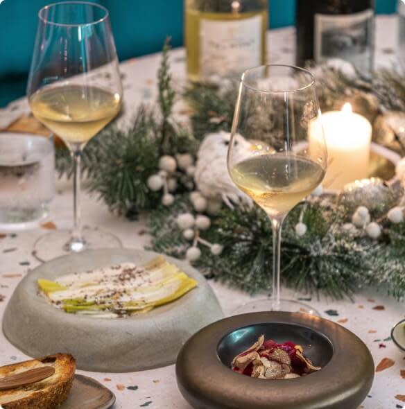 Glasses of white wine served with Christmas dinner