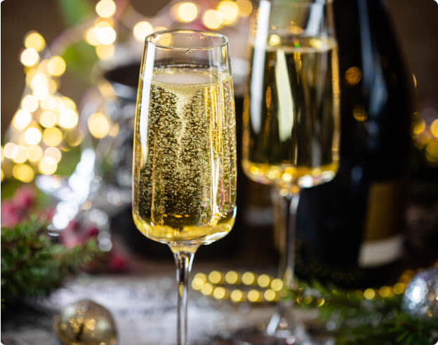 Two glasses of sparkling wine served at Christmas dinner