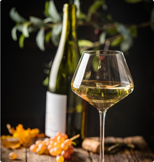 a glass of sweet white wine