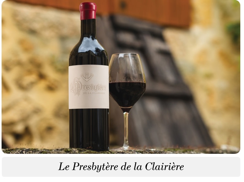 A bottle of Le Presbytère de la Clarière wine