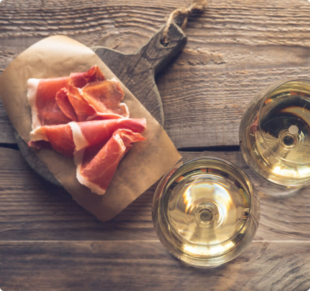 Italian prosciutto paired with white wine