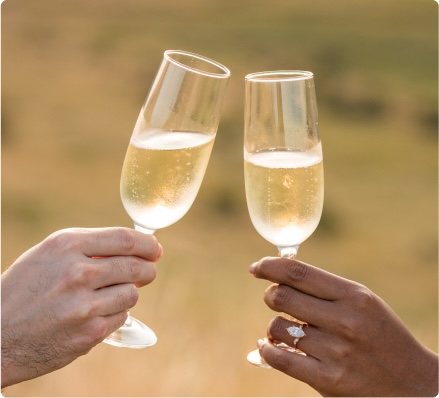 A toast with glasses of dry sparkling wine