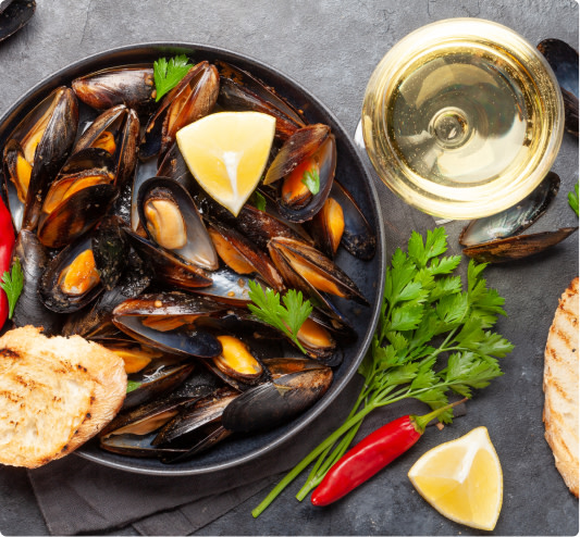 Dry white wine and steamed mussels