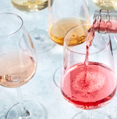 Different colors of rosé wine in glasses