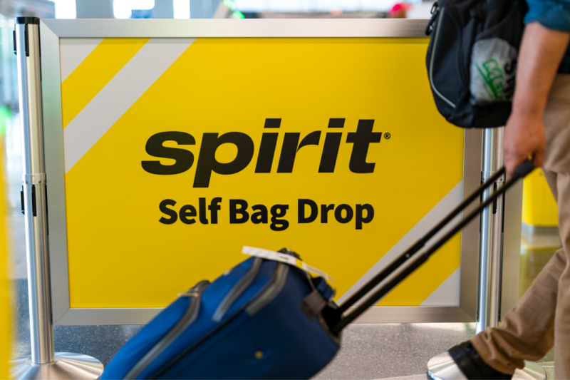 Spirit airlines check a bag deals