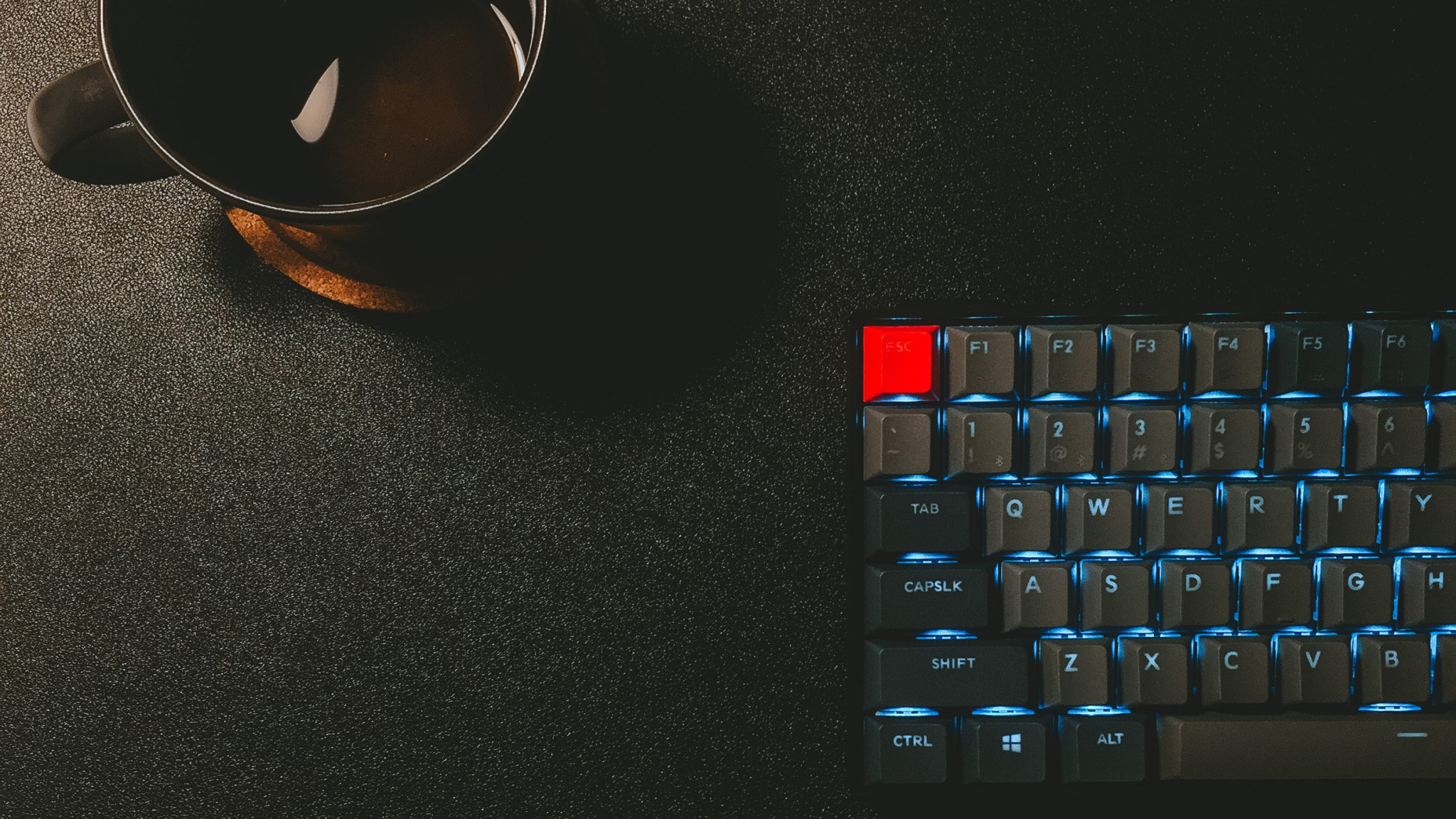 keyboard and coffee cup