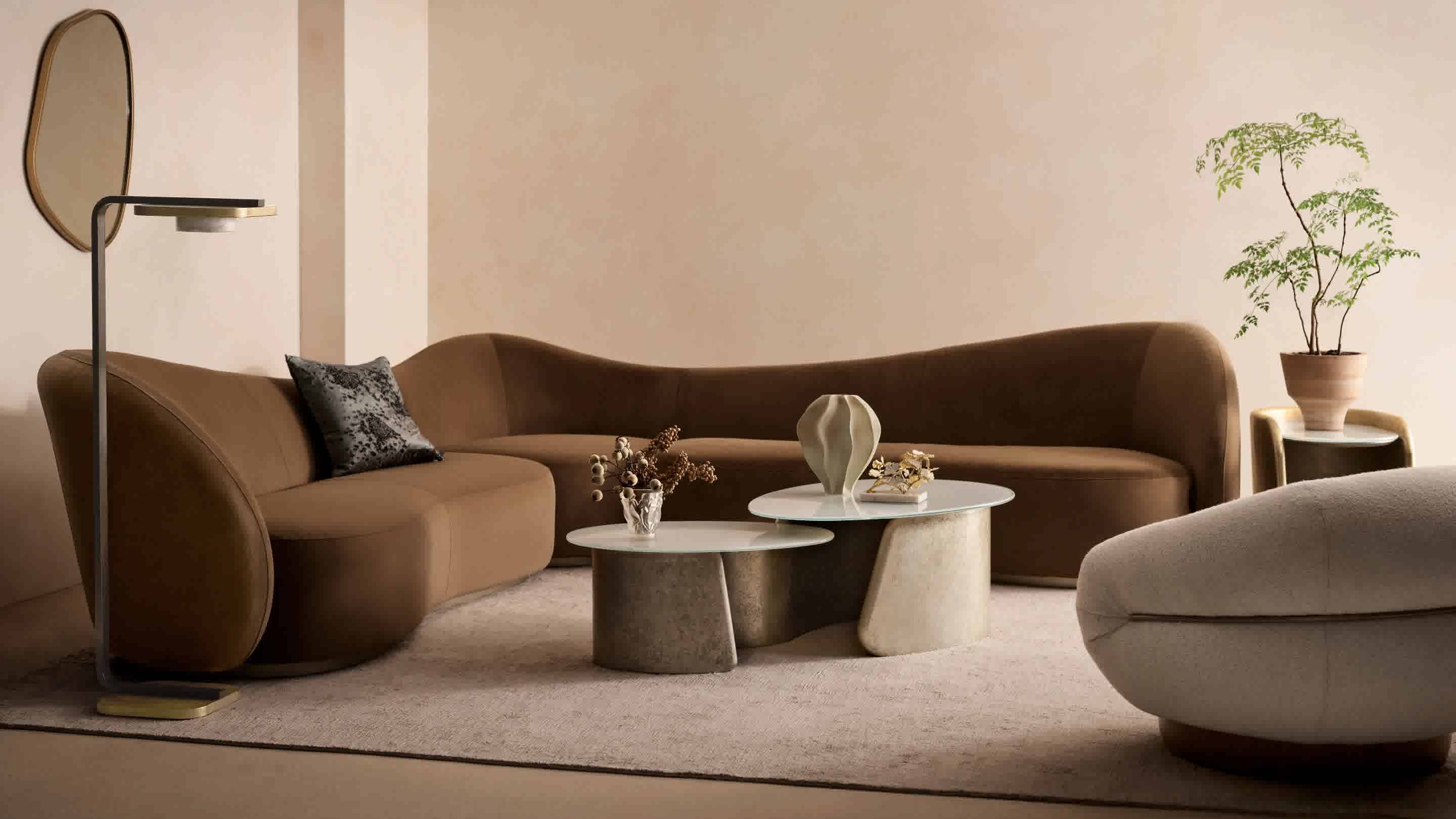 Kalahari Sectional, Smoosh Swivel Chair, Trebeck Floor Lamp, Bauble Cocktail Table​, Bauble Side Table, Scorpos Table Lamp