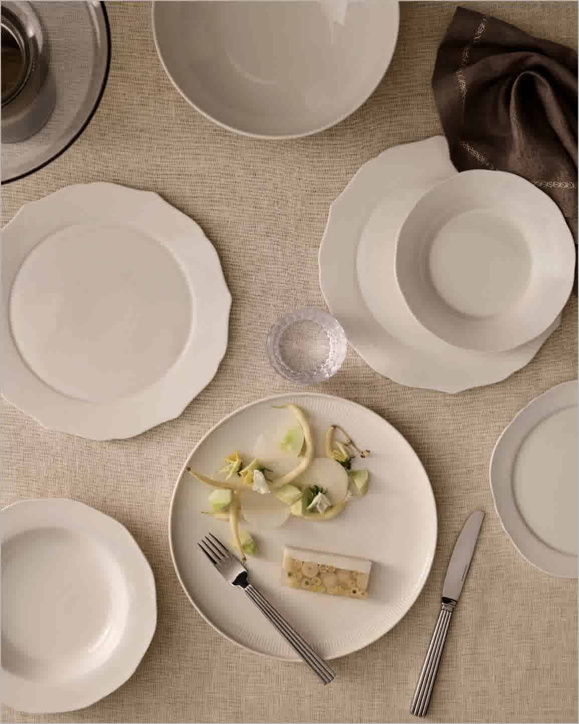 Afina Dinner, Salad Plate​ and Bowls, Georg Jensen Bernadotte 5 Piece Place Setting, Orrefors Ensemble Brown Vase, Classic Linen Napkin,  Jomo Highball, Jomo Tumbler, Jomo old Fashioned Glass,  Serax Dinner Plate, Serax Salad Plate