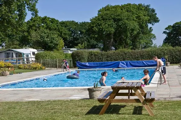 Orchard holiday park features two pools, one outside