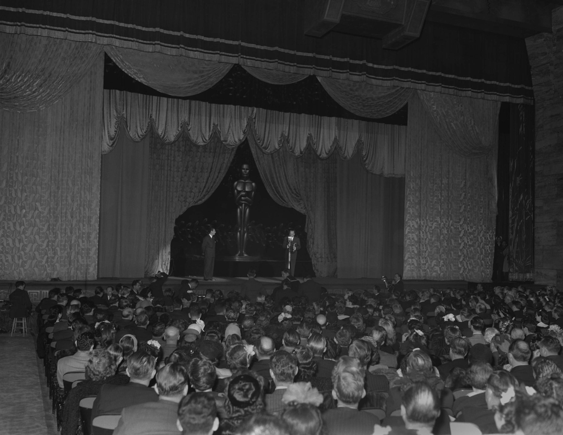 Michael Curtiz (right) winning the award for Best Directing for Casablanca (USA, 1943) with presenter Mark Sandrich (left) at the 16th Academy Awards ceremony at the Chinese Theatre 
Courtesy of Academy Awards show photographs, Margaret Herrick Library, Academy of Motion Picture Arts and Sciences