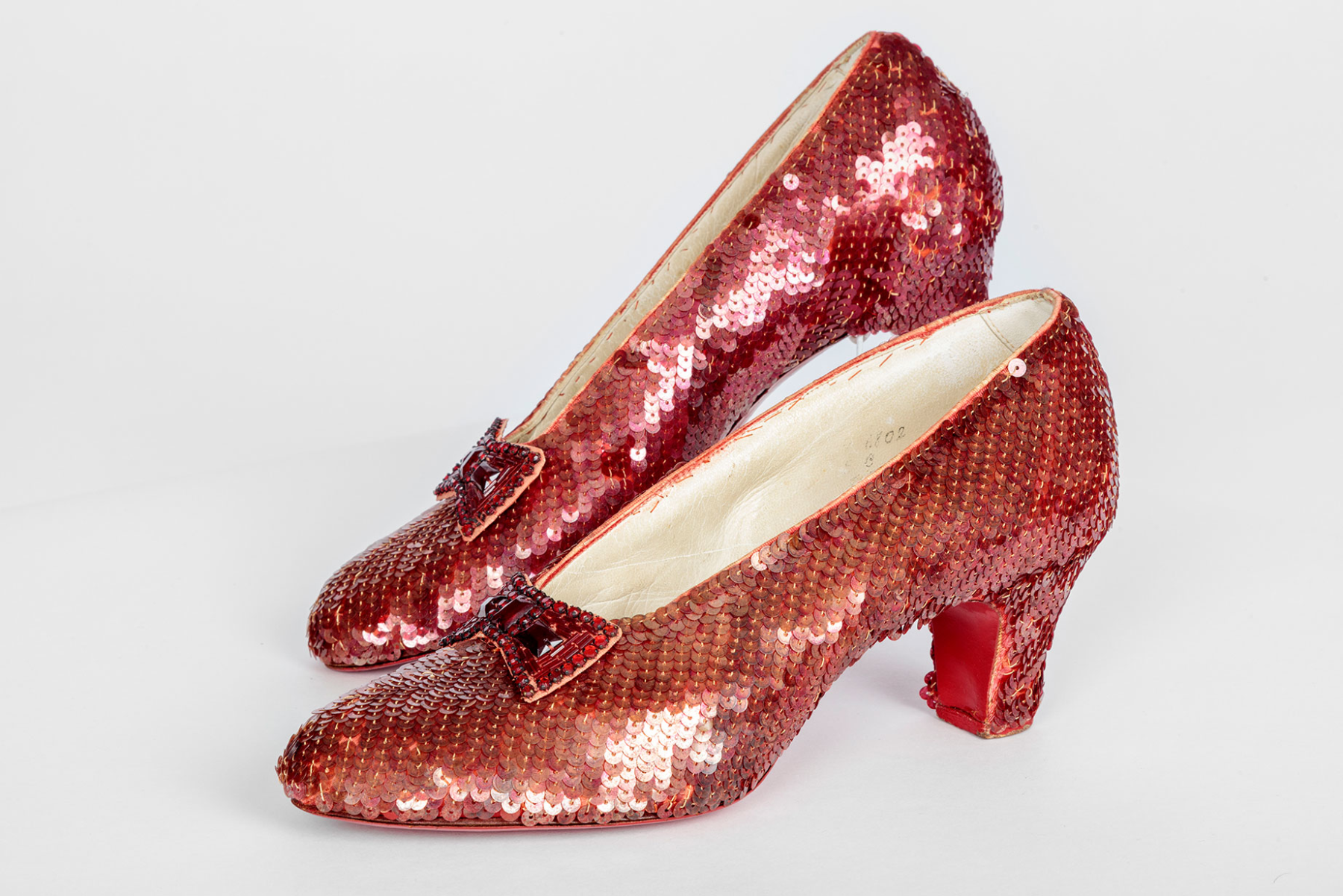 Screen-used close-up pair of the Ruby Slippers, designed by Adrian, from "The Wizard of Oz" (1939). Academy Museum of Motion Pictures. Photo by Joshua White, JWPictures/©Academy Museum Foundation