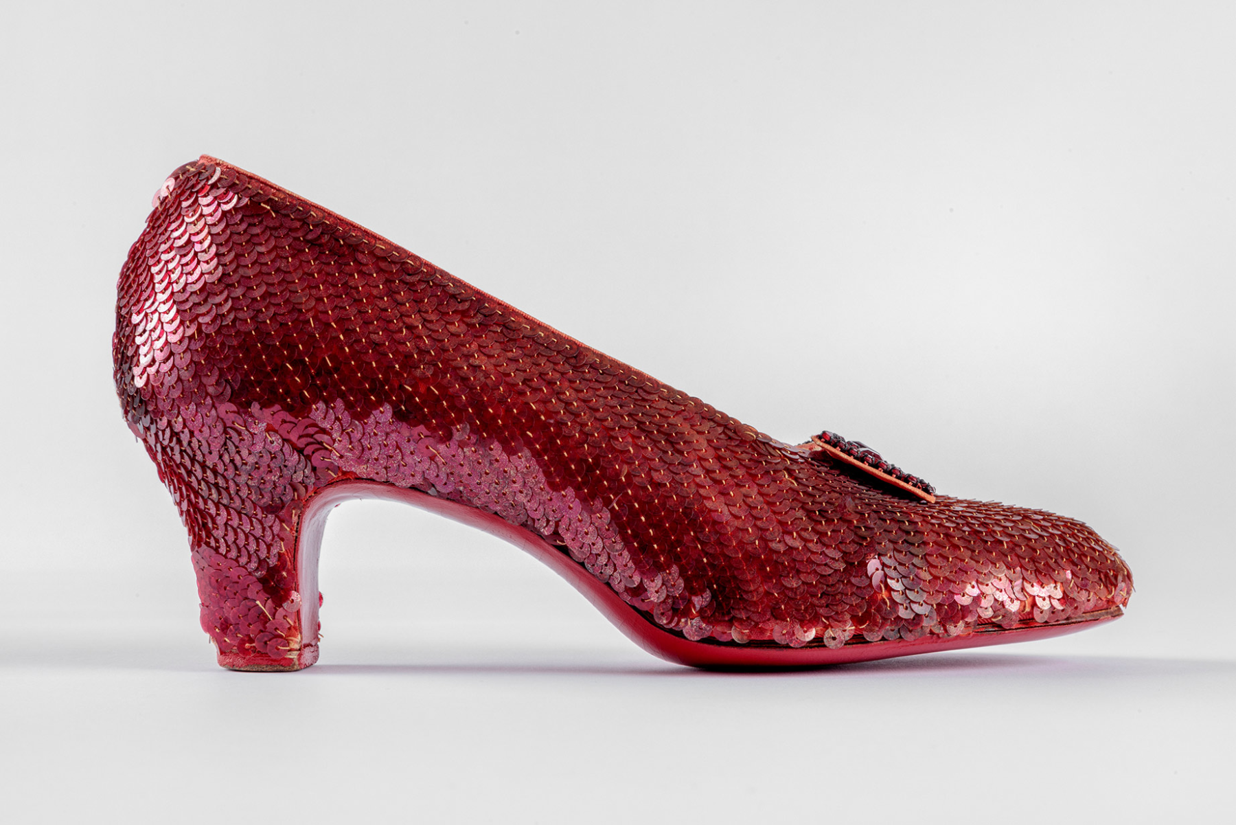 Screen-used close-up pair of the Ruby Slippers, designed by Adrian, from "The Wizard of Oz" (1939). Academy Museum of Motion Pictures. Photo by Joshua White, JWPictures/©Academy Museum Foundation