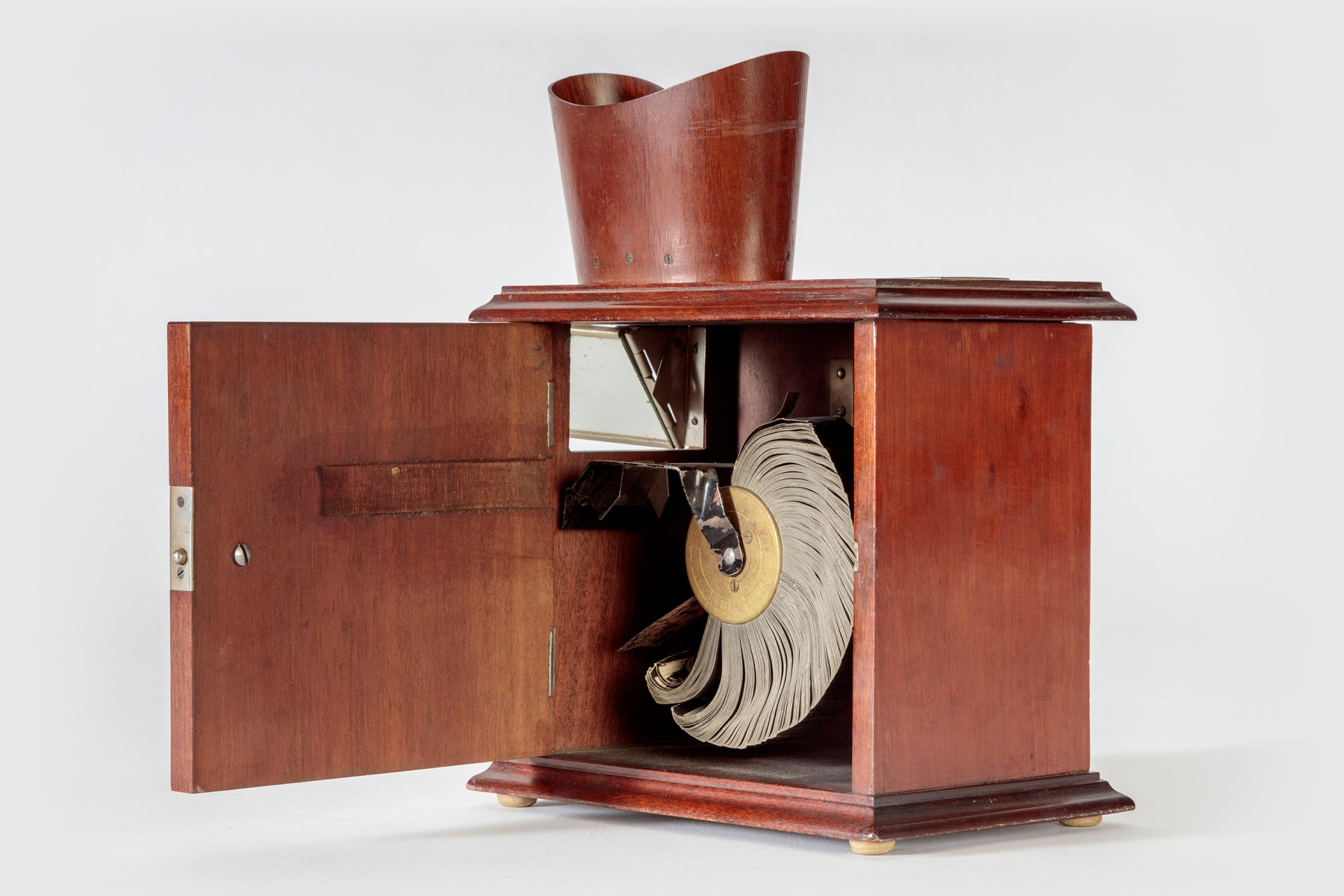 Casler-Lumière Kinora and Reel, L. Gaumont et Cie. Wood, glass, and metal with a photo reproduction on paper and metal reel, c. 1900, France, from the Richard Balzer Collection, gift of Patricia Bellinger Balzer, Photo by Joshua White/JW Pictures, ©Academy Museum Foundation