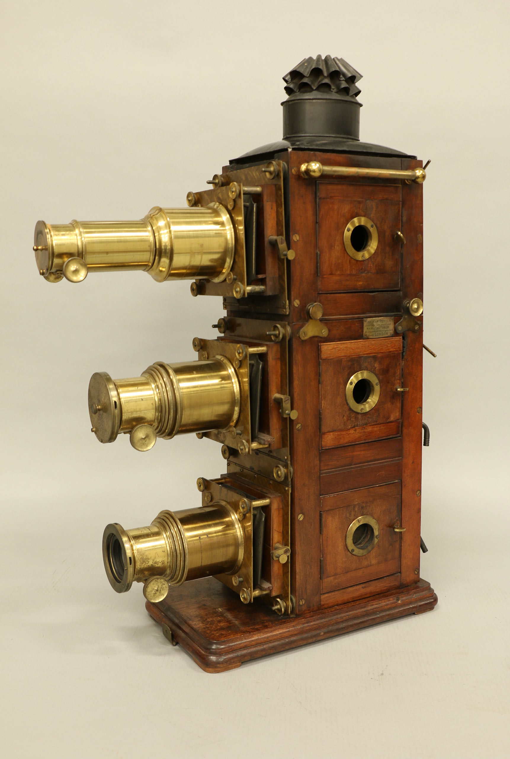 Triunial Magic Lantern, produced by Chatham Paxton, Wood, brass, and glass, 1891, Great Britain, from the Richard Balzer Collection, gift of Patricia Bellinger Balzer, Photo by Richard Balzer