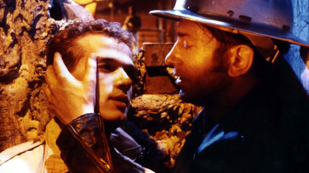 The film charts the journey of its antihero Querelle through a labyrinth of illicit drug deals, high-stakes gambling, and violent acts in a seedy French port town.