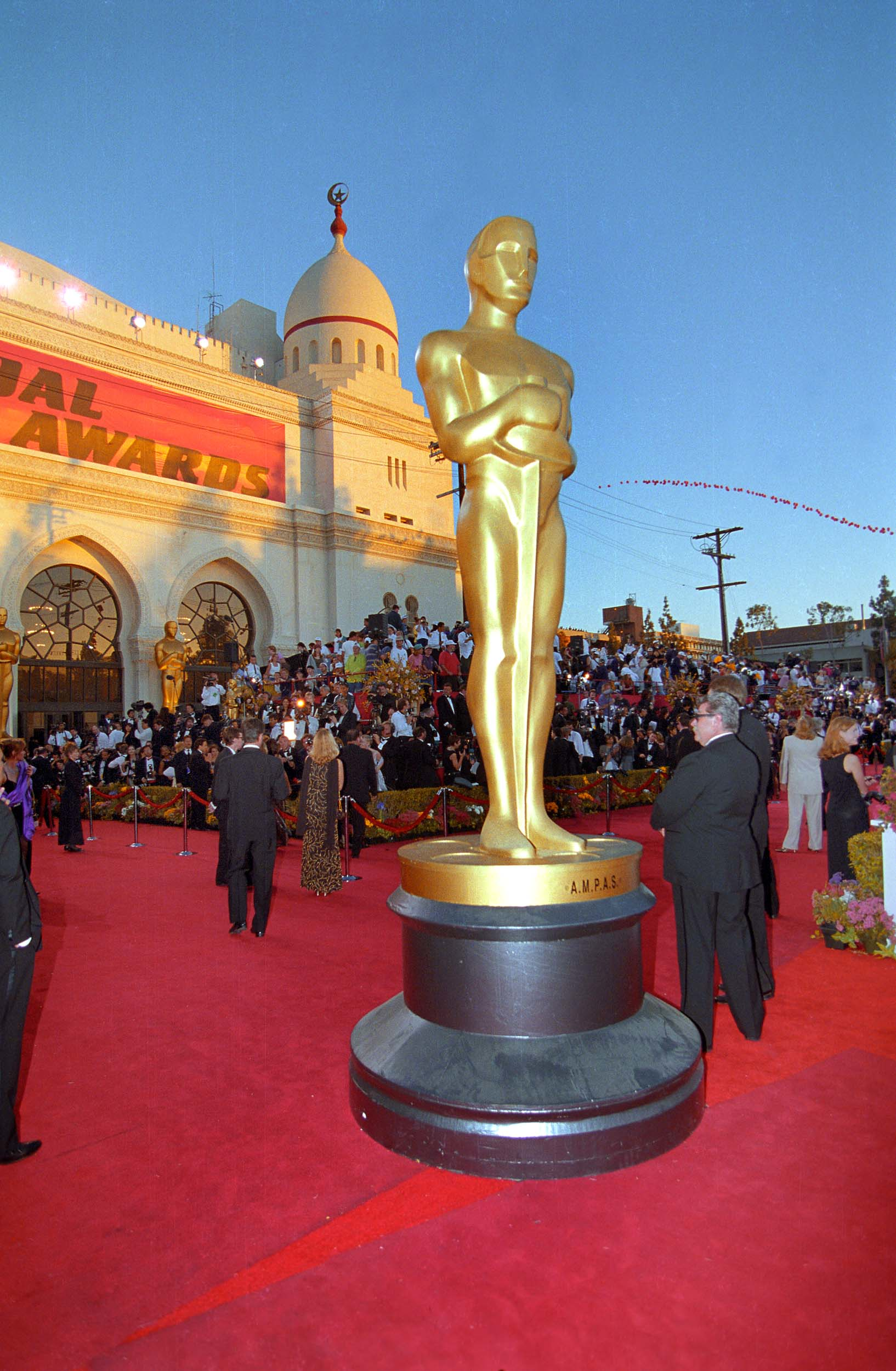 A large replica of the Oscar statuette on the red carpet outside of the Shrine Auditorium during the Academy Awards ceremony, 1998 

Courtesy of Academy Awards show photographs, Margaret Herrick Library, Academy of Motion Picture Arts and Sciences, photo: Long Photography 