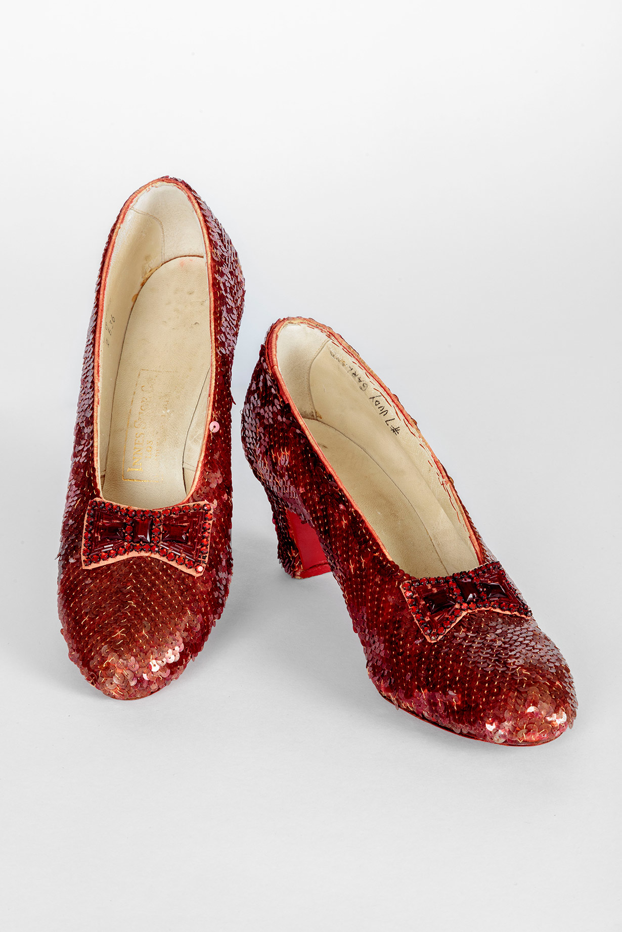 Screen-used close-up pair of the Ruby Slippers, designed by Adrian, from "The Wizard of Oz" (1939). Academy Museum of Motion Pictures. Photo by Joshua White, JWPictures/©Academy Museum Foundation