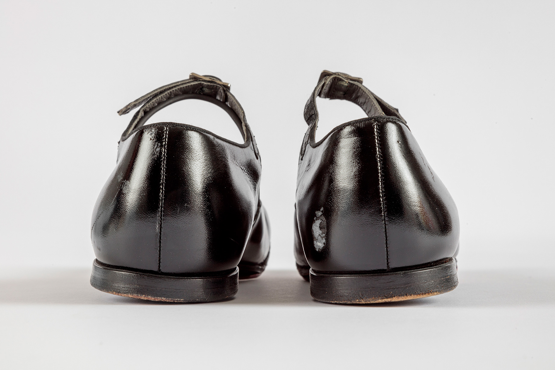 Shirley Temple's tap shoes and practice steps used during filming of <i>The Little Colonel</i> (1935).  Academy Museum of Motion Pictures, Gift of Shirley Temple Black and Family. Photo by Joshua White, JWPictures/©Academy Museum Foundation