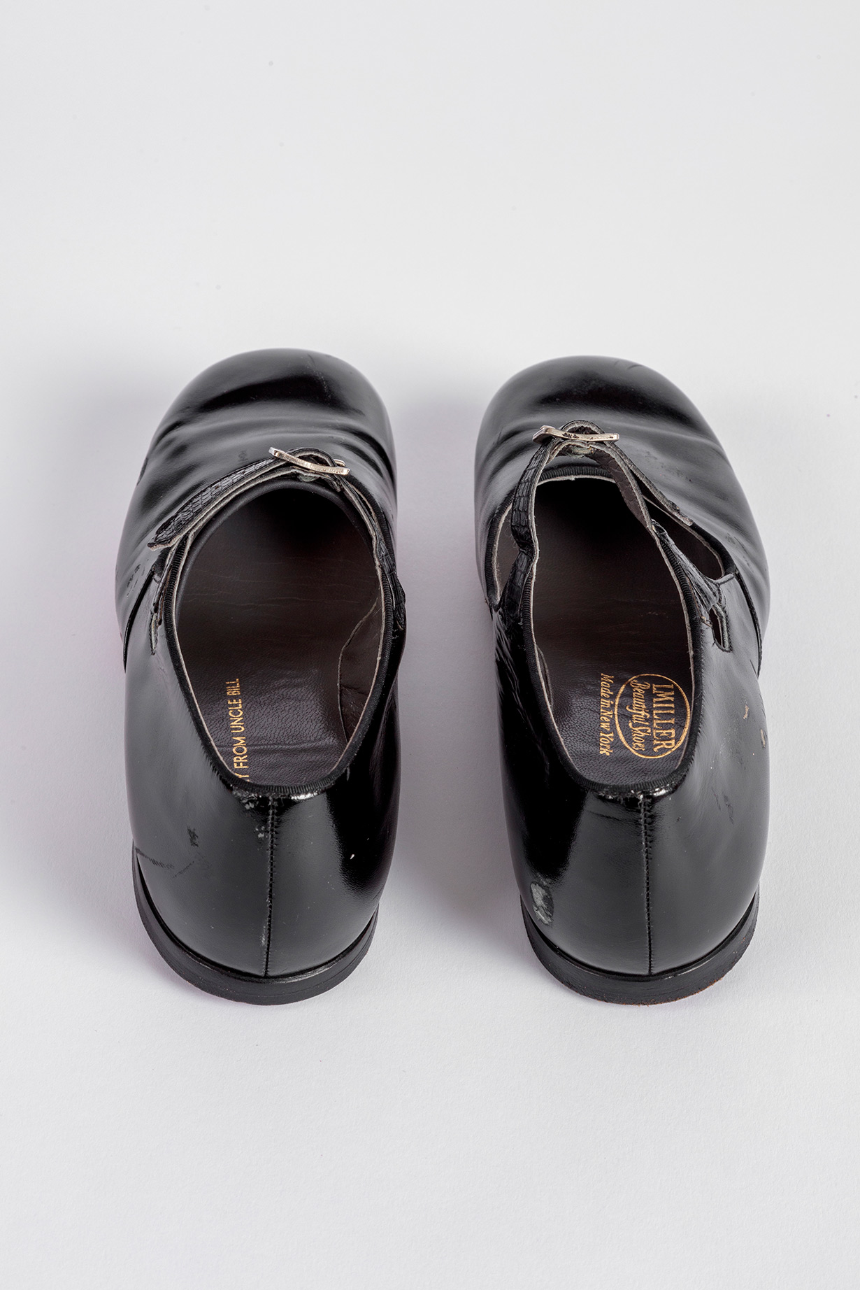 Shirley Temple's tap shoes and practice steps used during filming of <i>The Little Colonel</i> (1935). Academy Museum of Motion Pictures, Gift of Shirley Temple Black and Family. Photo by Joshua White, JWPictures/©Academy Museum Foundation